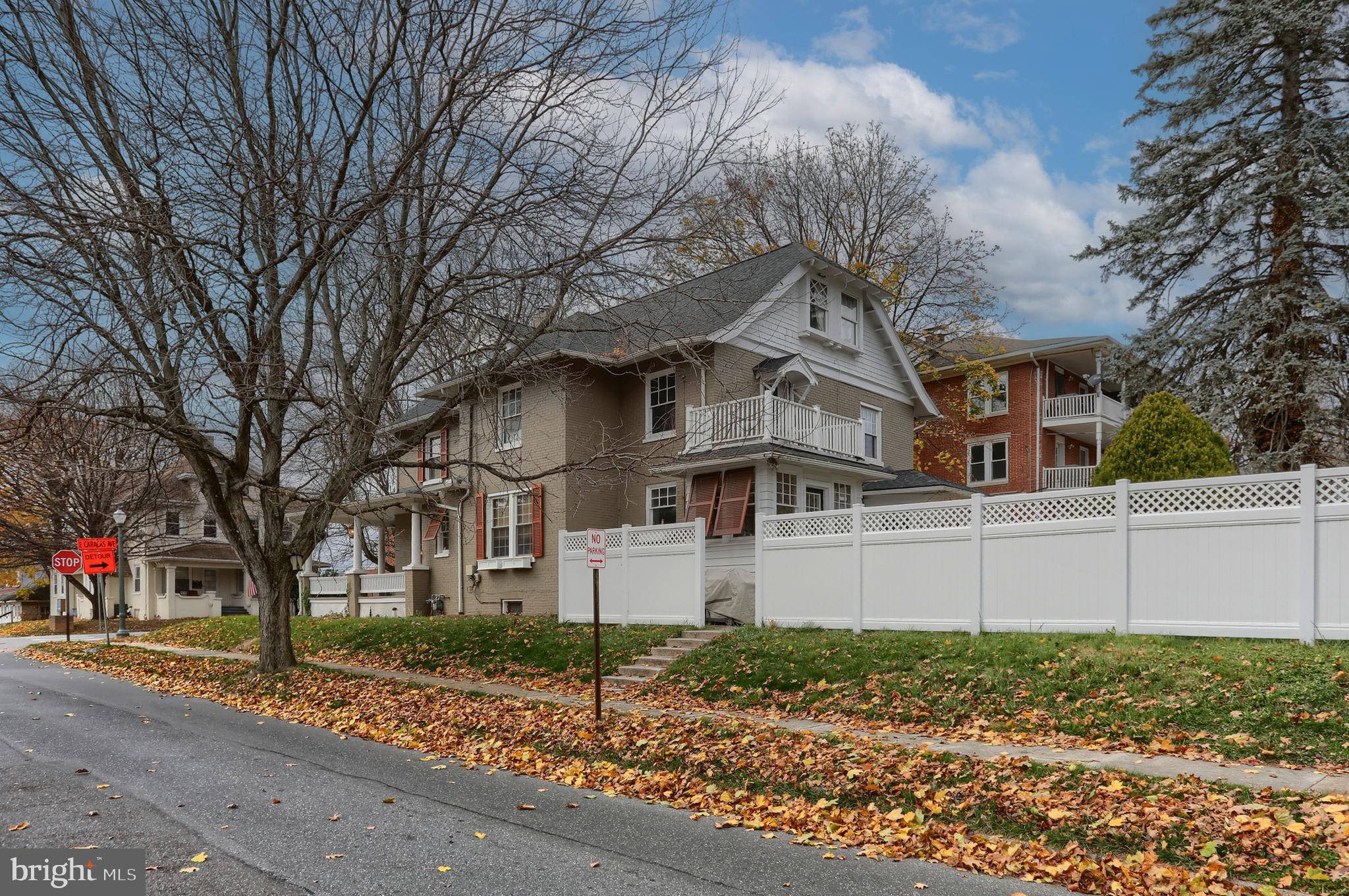 229 Cocoa Avenue Hershey, PA 17033 - Photo 23 of 28 a front view of a house with a yard and garage