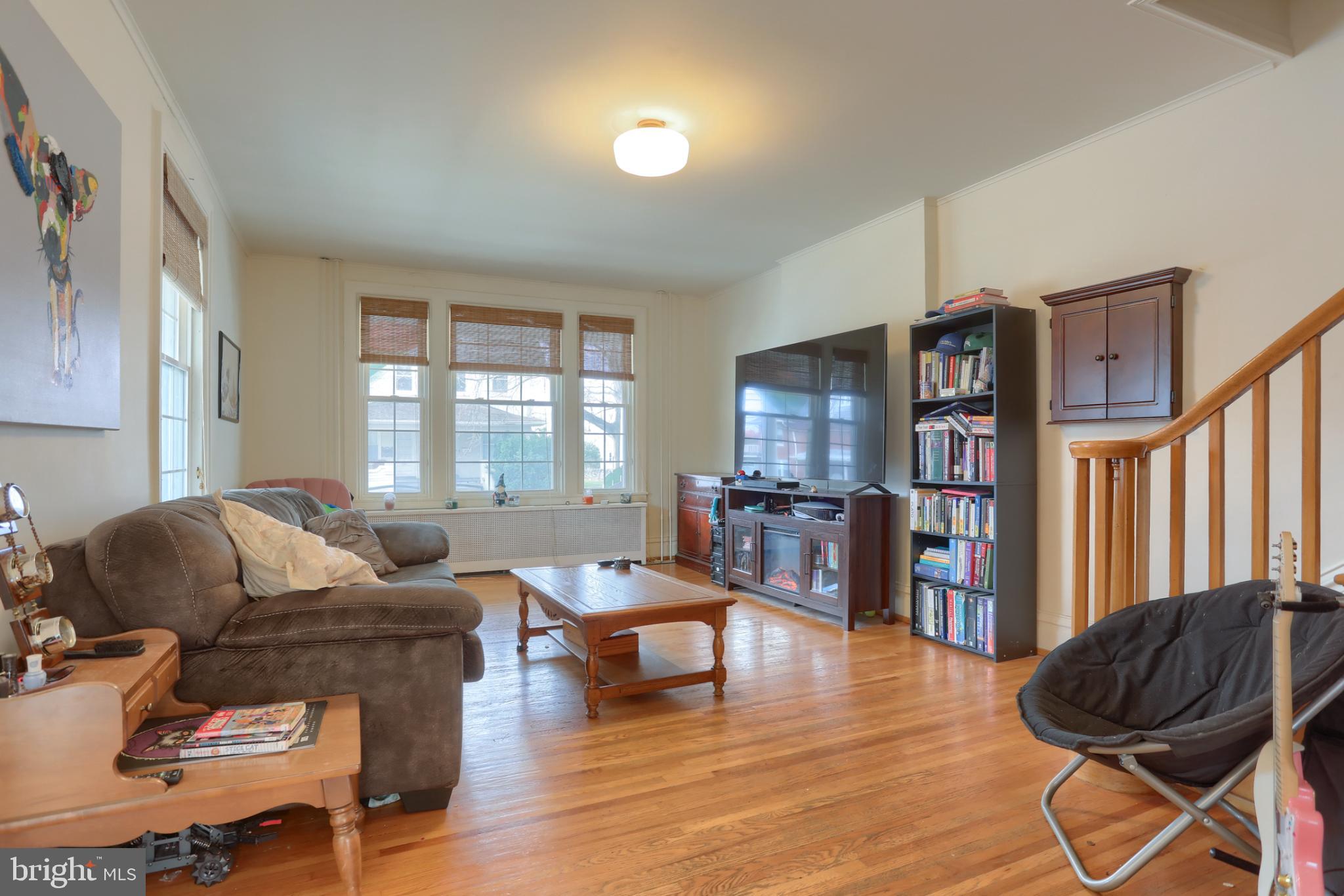 229 Cocoa Avenue Hershey, PA 17033 - Photo 5 of 28 a living room with furniture window and wooden floor