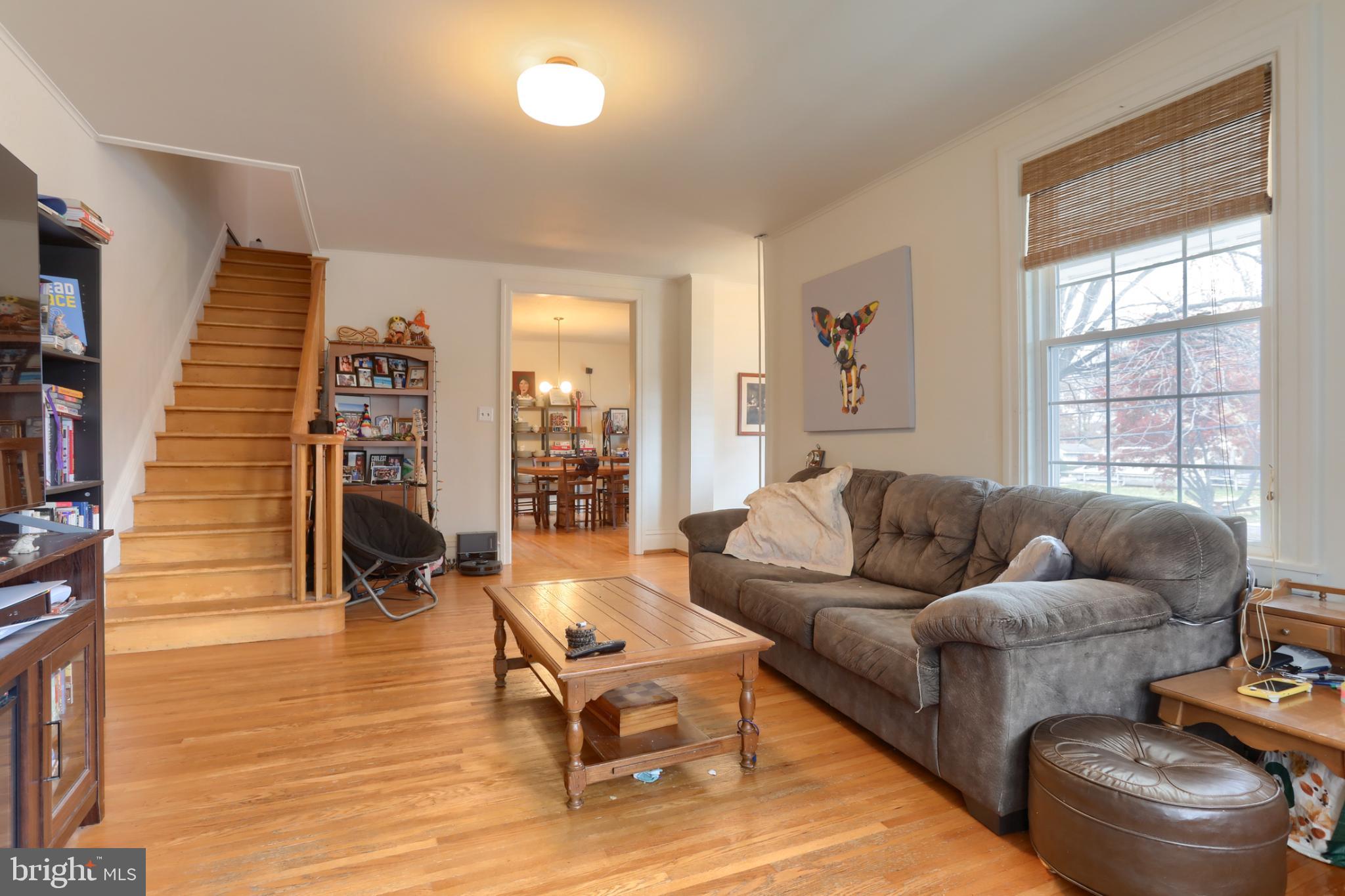 229 Cocoa Avenue Hershey, PA 17033 - Photo 6 of 28 a living room with furniture and wooden floor
