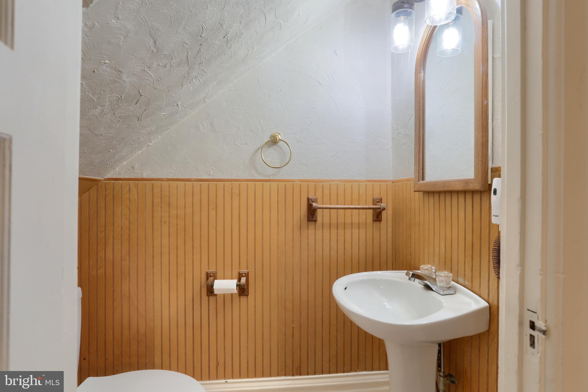 229 Cocoa Avenue Hershey, PA 17033 - Photo 9 of 28 a bathroom with a sink mirror and toilet