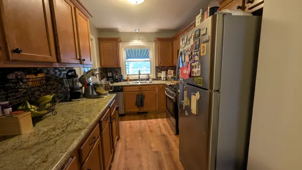 a kitchen with lots of counter top space and a sink