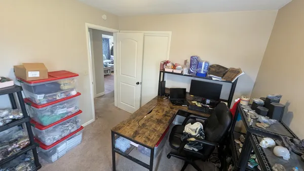 a bedroom with a bed and furniture