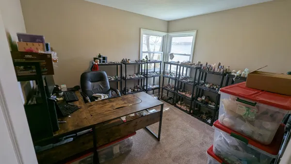 a room with furniture and wooden floor