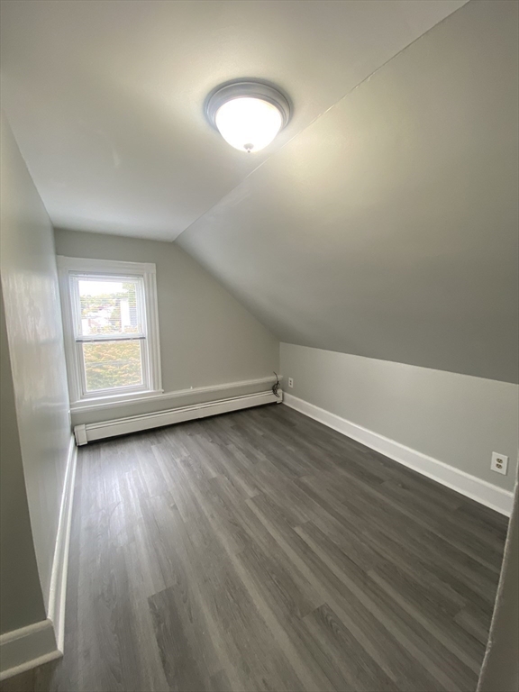 2 Swetts Court Watertown, MA 02472 - Photo 13 of 17 an empty room with wooden floor and windows