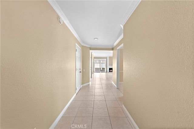 a kitchen with stainless steel appliances granite countertop a refrigerator sink and stove