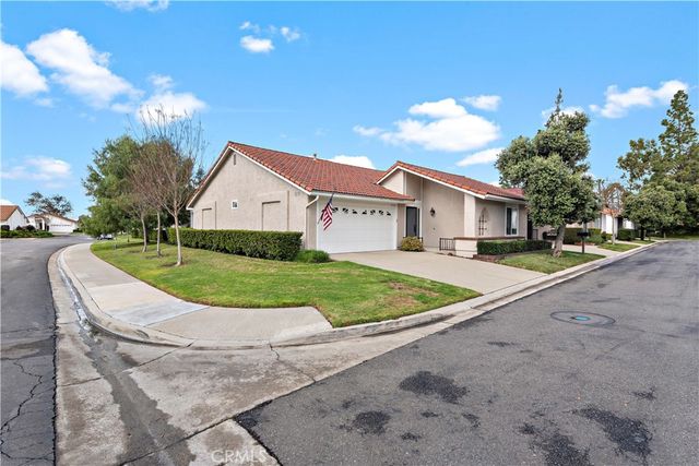 a view of house with outdoor space and street view