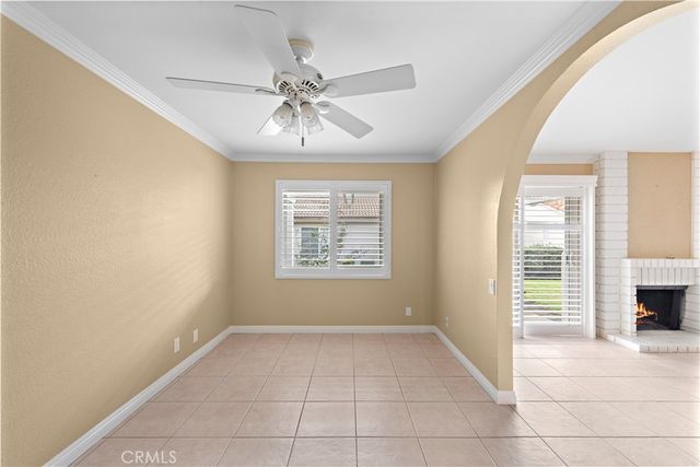a view of a livingroom with an empty space and a window