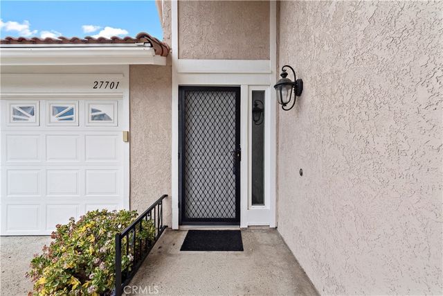 a view of a hallway with entryway