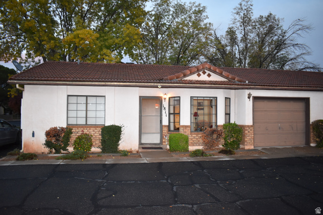 1811 West 950 North, Unit 95 St. George, UT 84770 - Photo 1 of 1 Mediterranean / spanish-style house featuring brick siding, stucco siding, and a tile roof