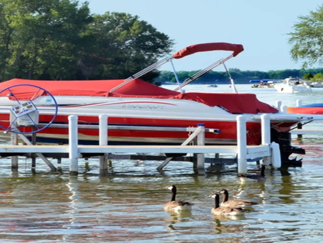 a dining space with pool table and chairs