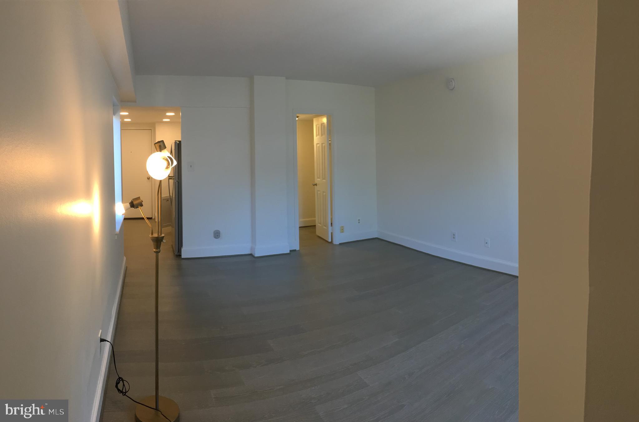 1825 T Street Northwest, Unit 303 Washington, DC 20009 - Photo 5 of 16 Main living space, with two windows