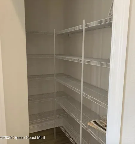 a room with walk in closet
