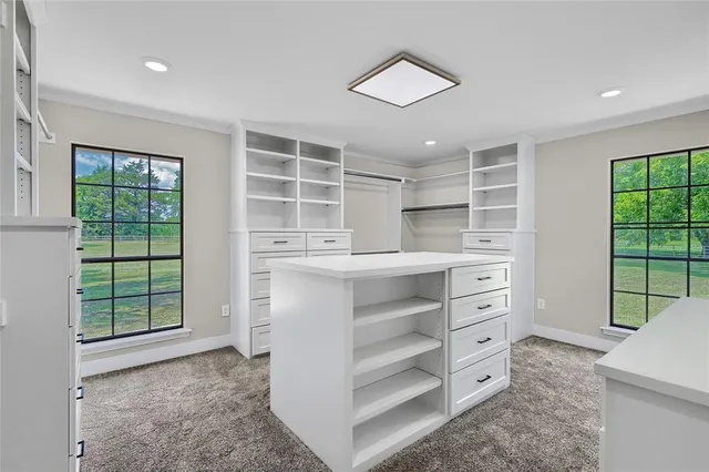 a view of cabinets and window