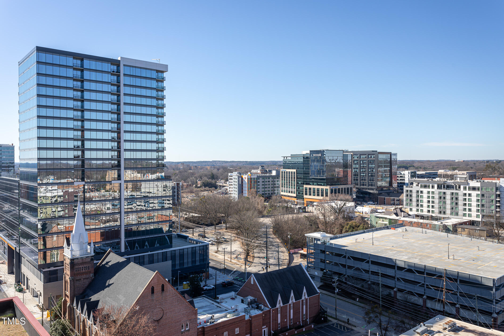122 North Harrington Street, Unit 1075 Raleigh, NC 27603 - Photo 34 of 38 a view of a city that has tall buildings