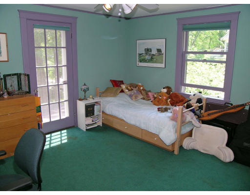 181 Nehoiden Road Newton, MA 02468 - Photo 14 of 24 a bed room with a bed and a window