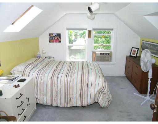 181 Nehoiden Road Newton, MA 02468 - Photo 16 of 24 a bed sitting in a bedroom next to a window