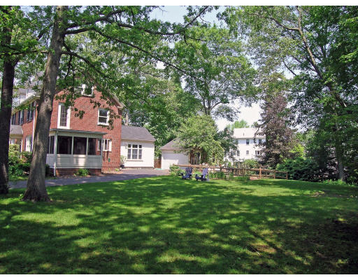 181 Nehoiden Road Newton, MA 02468 - Photo 24 of 24 a front view of a house with a garden