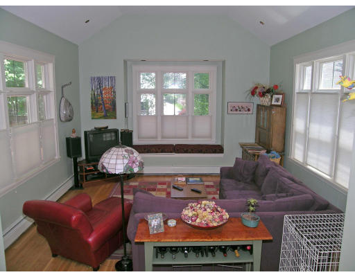 181 Nehoiden Road Newton, MA 02468 - Photo 9 of 24 a living room with furniture and a fireplace