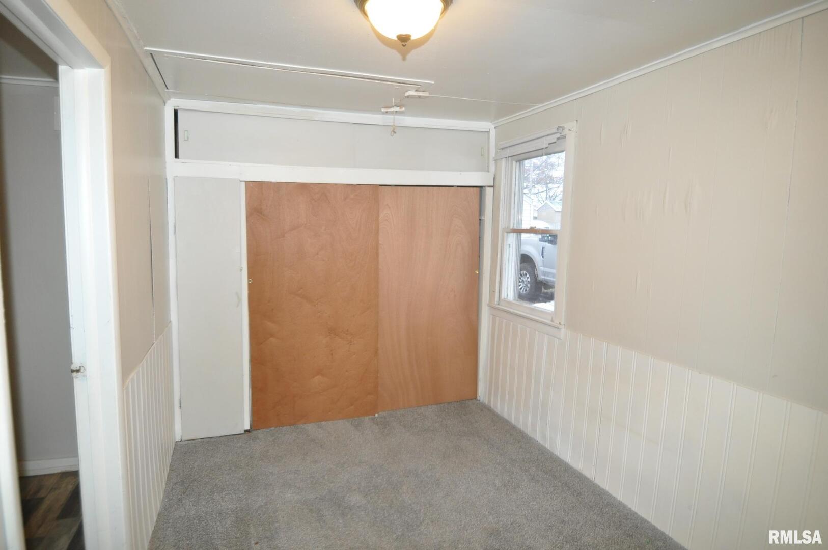 224 4th Street Colona, IL 61241 - Photo 7 of 12 a view of an empty room