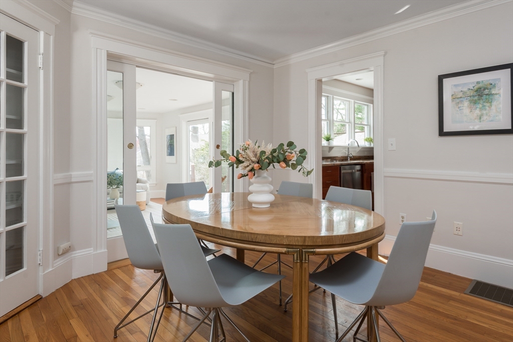 33 Ottawa Road Arlington, MA 02476 - Photo 11 of 38 a view of a dining room with furniture and wooden floor