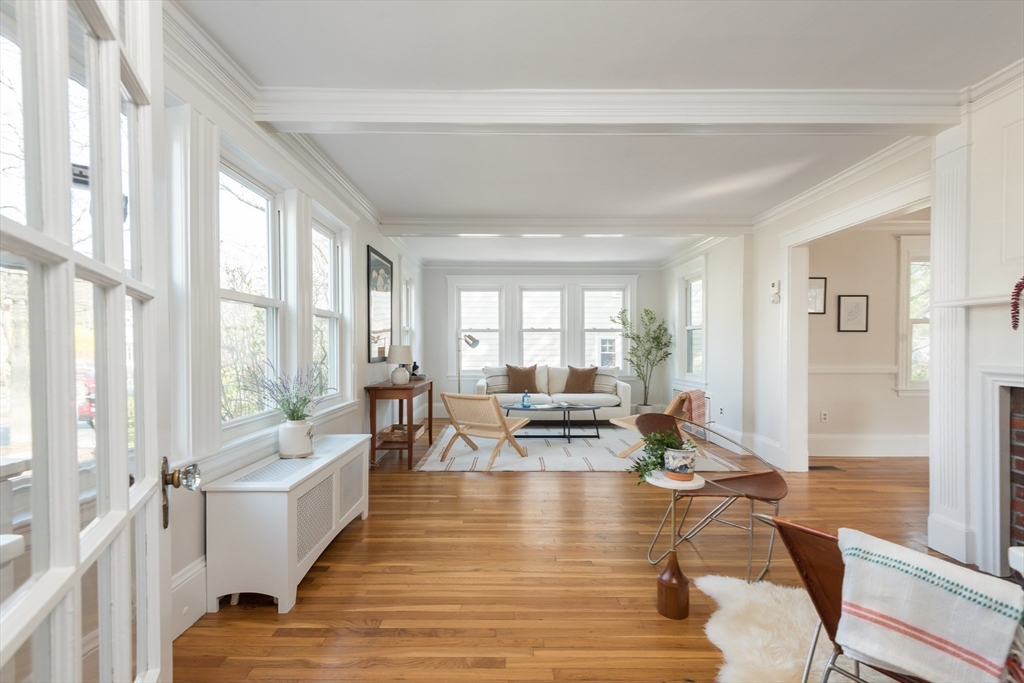 33 Ottawa Road Arlington, MA 02476 - Photo 18 of 38 a living room with furniture large window and wooden floor