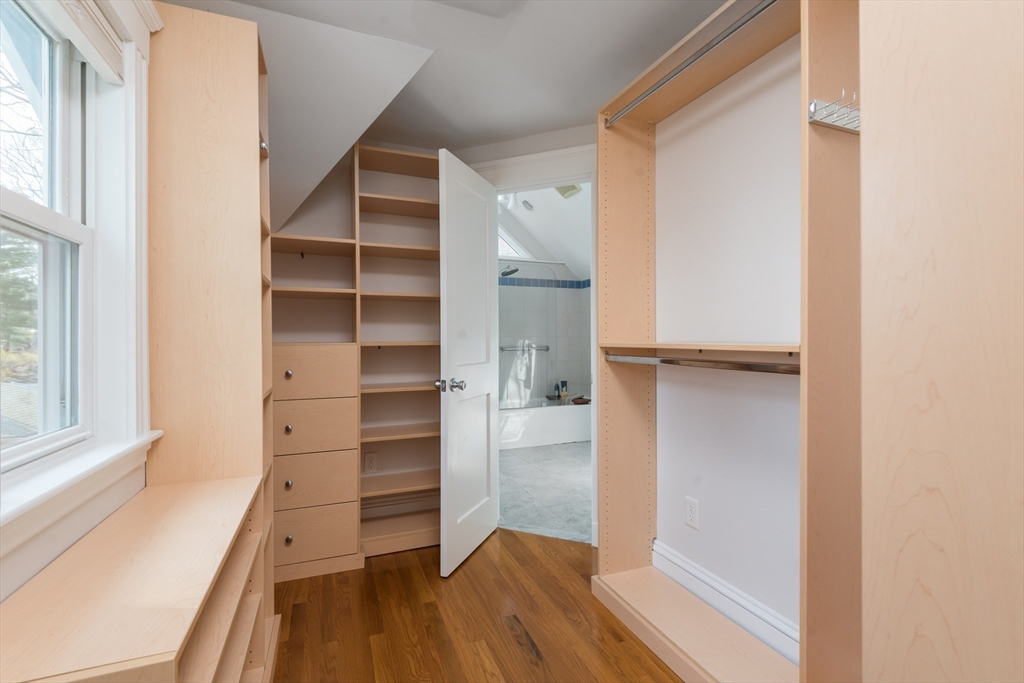 33 Ottawa Road Arlington, MA 02476 - Photo 26 of 38 a view of walk in closet with empty racks