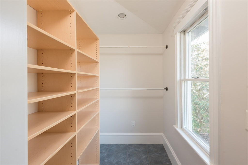 33 Ottawa Road Arlington, MA 02476 - Photo 34 of 38 a view of walk in closet with empty racks