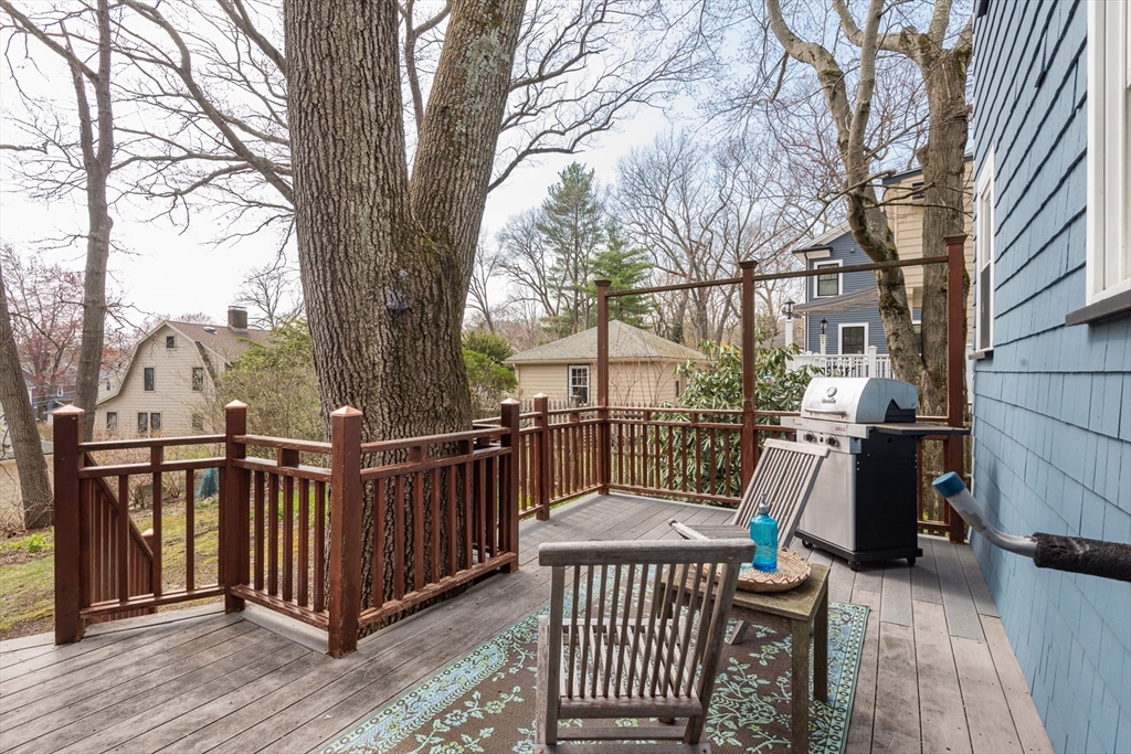 33 Ottawa Road Arlington, MA 02476 - Photo 35 of 38 a view of a chair and table on the wooden floor