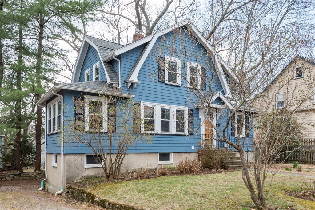 33 Ottawa Road Arlington, MA 02476 - Photo 38 of 38 a front view of a house with a yard