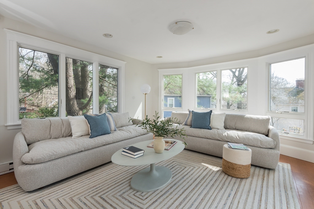33 Ottawa Road Arlington, MA 02476 - Photo 4 of 38 a living room with furniture and a large window