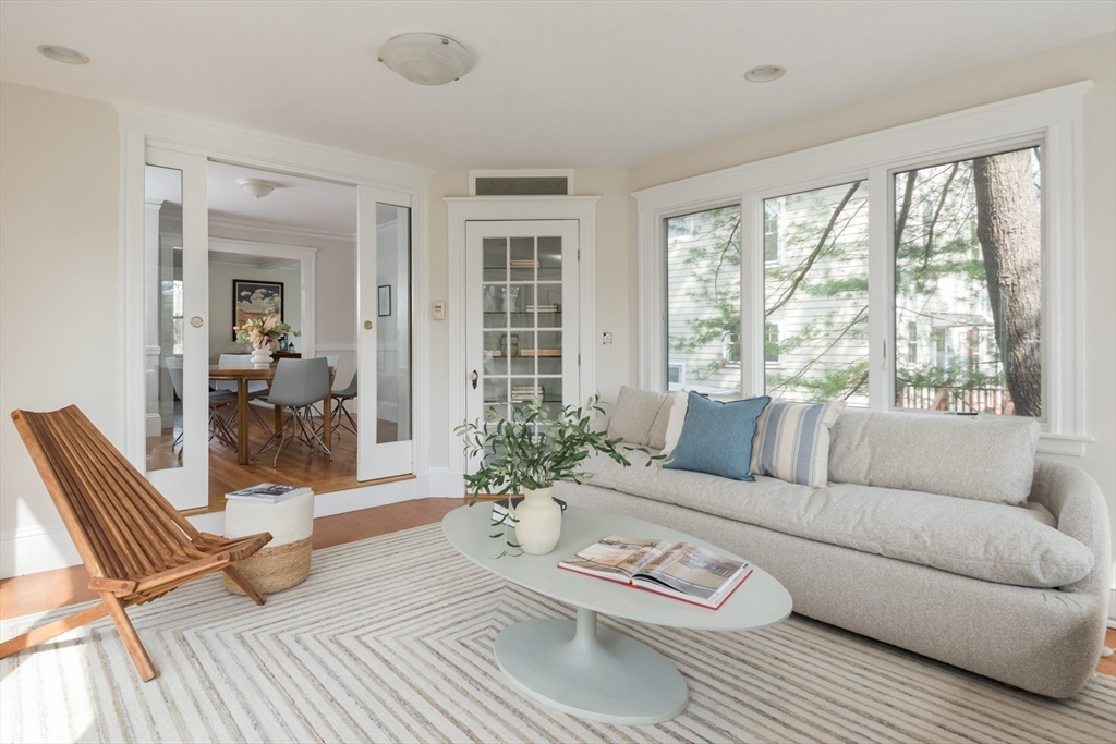 33 Ottawa Road Arlington, MA 02476 - Photo 8 of 38 a living room with furniture and a large window
