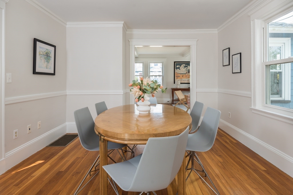 33 Ottawa Road Arlington, MA 02476 - Photo 9 of 38 a view of a dining room with furniture and wooden floor