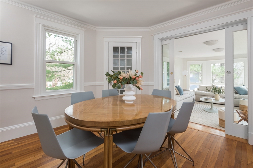33 Ottawa Road Arlington, MA 02476 - Photo 10 of 38 a view of a dining room with furniture wooden floor and a chandelier