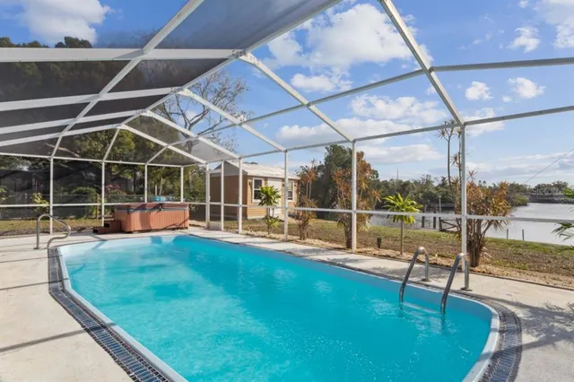 a view of a chairs and table in the patio