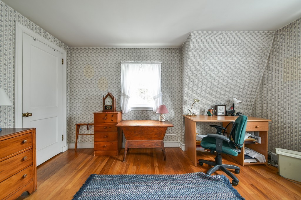 64 Carey Road Needham, MA 02494 - Photo 5 of 22 a living room with furniture and a wooden floor