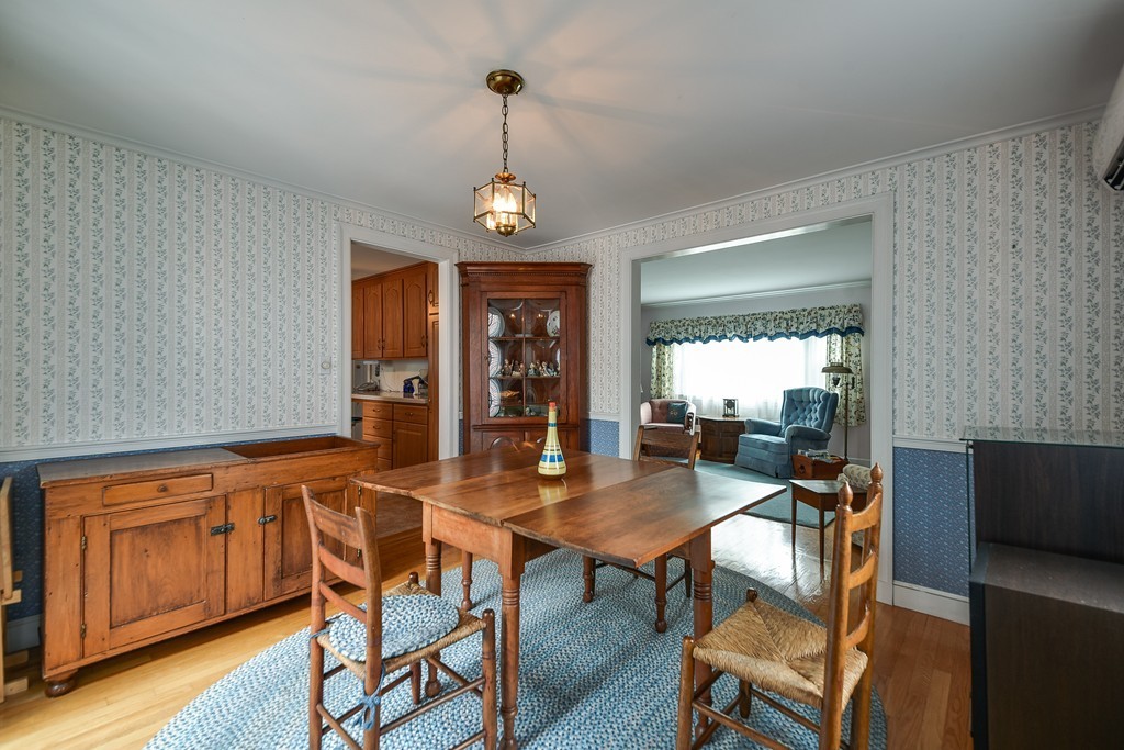 64 Carey Road Needham, MA 02494 - Photo 9 of 22 a view of a dining room with furniture window and wooden floor