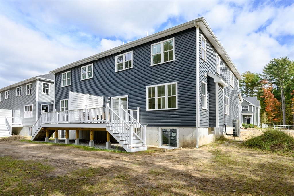 20 Howland Trail, Unit 35 Hanson, MA 02341 - Photo 12 of 26 a house view with a outdoor space