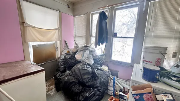 a room with furniture and a window