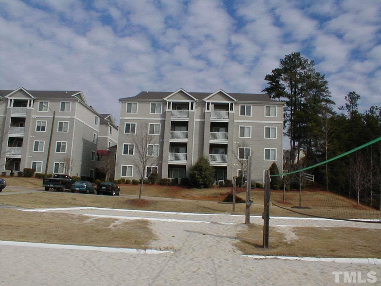 1441 Collegiate Circle, Unit 301 Raleigh, NC 27606 - Photo 1 of 3 a front view of a building with street view