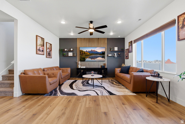 3902 West 825 North West Point, UT 84015 - Photo 19 of 49 Living room with ceiling fan, light wood finished floors, and recessed lighting