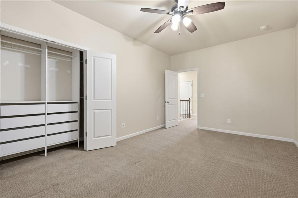 2495 Matlin Way Buford, GA 30519 - Photo 27 of 36 a view of an empty room with a window