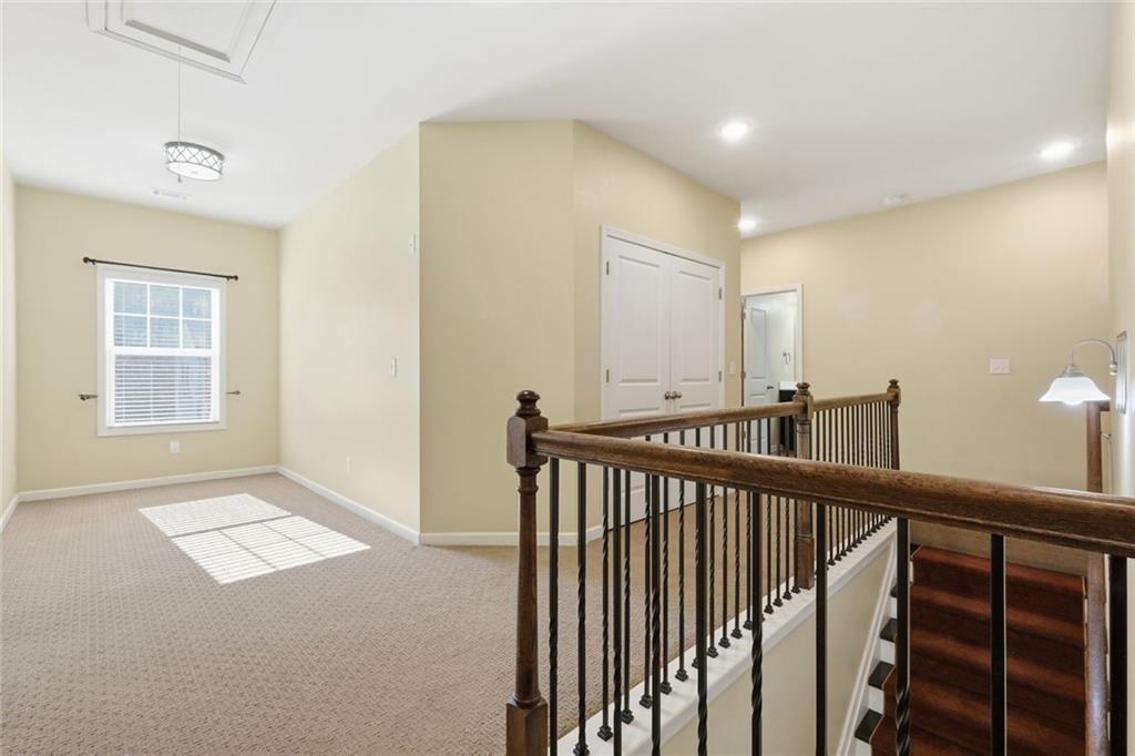 2495 Matlin Way Buford, GA 30519 - Photo 29 of 36 a view of hallway with windows