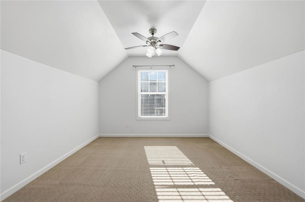 2495 Matlin Way Buford, GA 30519 - Photo 30 of 36 a view of an empty room with a window