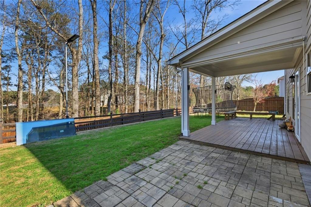 2495 Matlin Way Buford, GA 30519 - Photo 36 of 36 a view of a backyard with sitting area