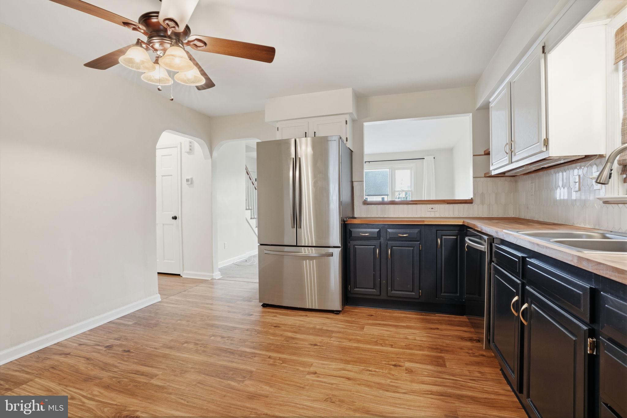 51 Unwin Drive Hamilton, NJ 08610 - Photo 15 of 32 a kitchen with stainless steel appliances granite countertop a refrigerator a stove and a sink