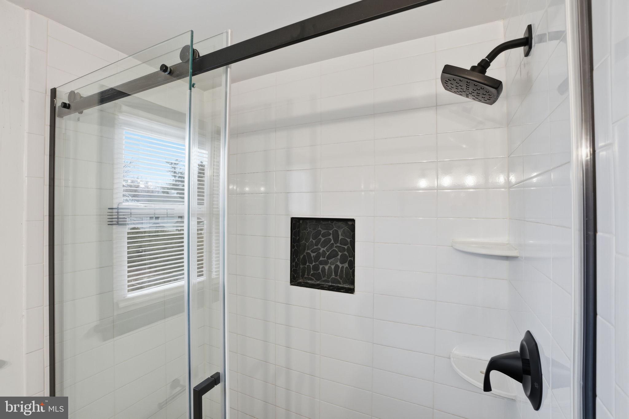 51 Unwin Drive Hamilton, NJ 08610 - Photo 21 of 32 a bathroom with a shower