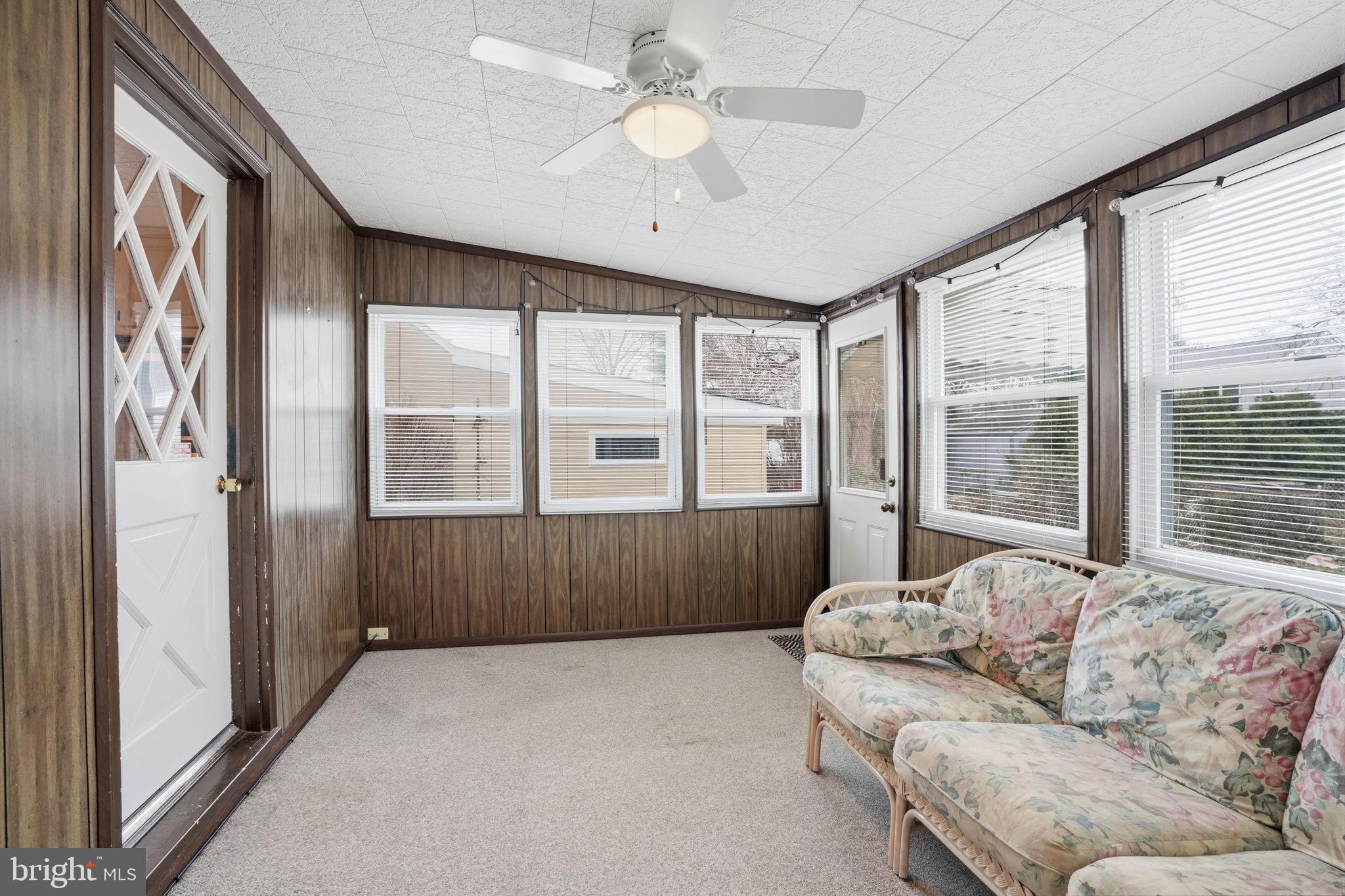 51 Unwin Drive Hamilton, NJ 08610 - Photo 22 of 32 a living room with furniture and large windows