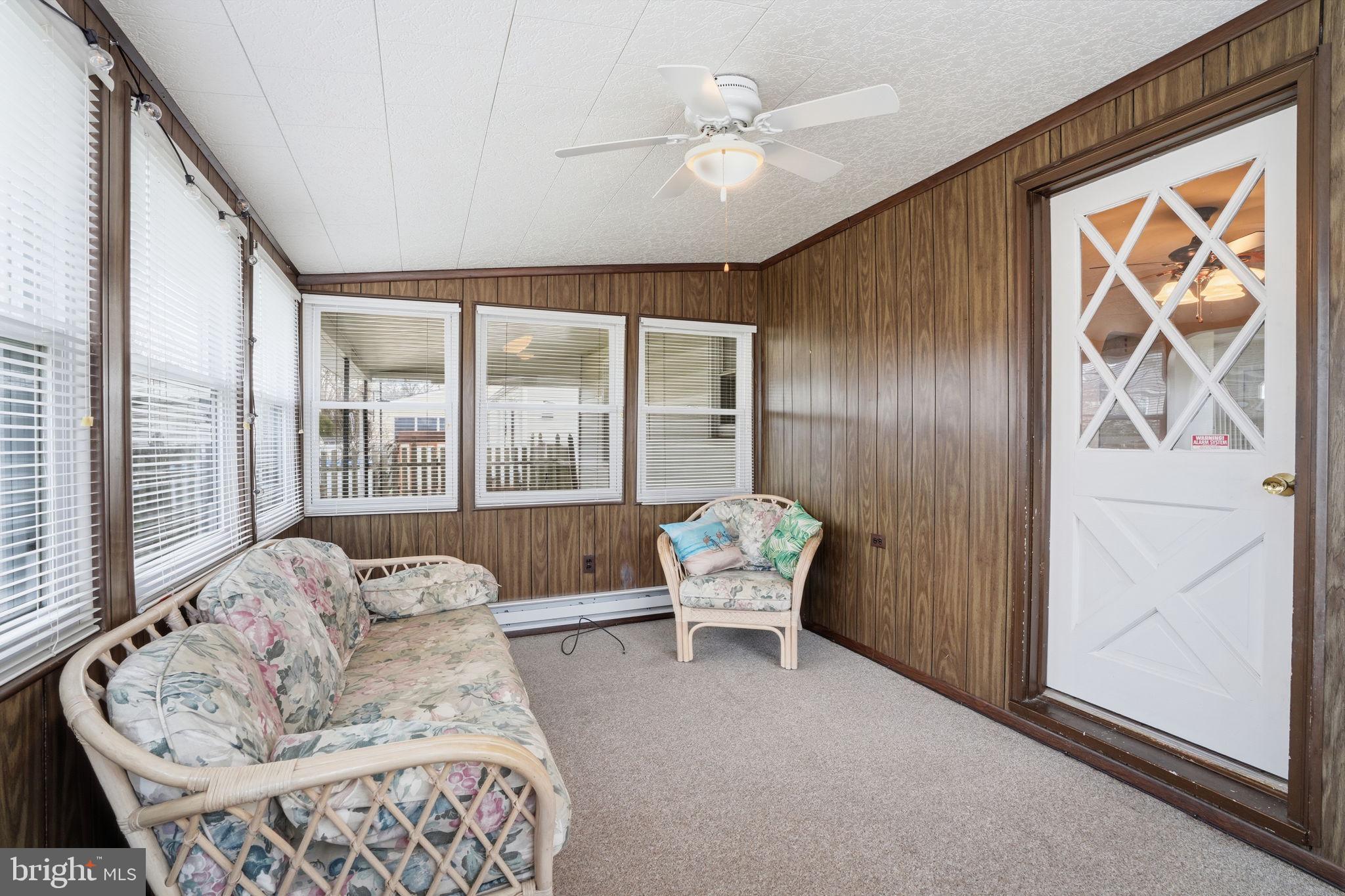 51 Unwin Drive Hamilton, NJ 08610 - Photo 23 of 32 a living room with furniture and a large window