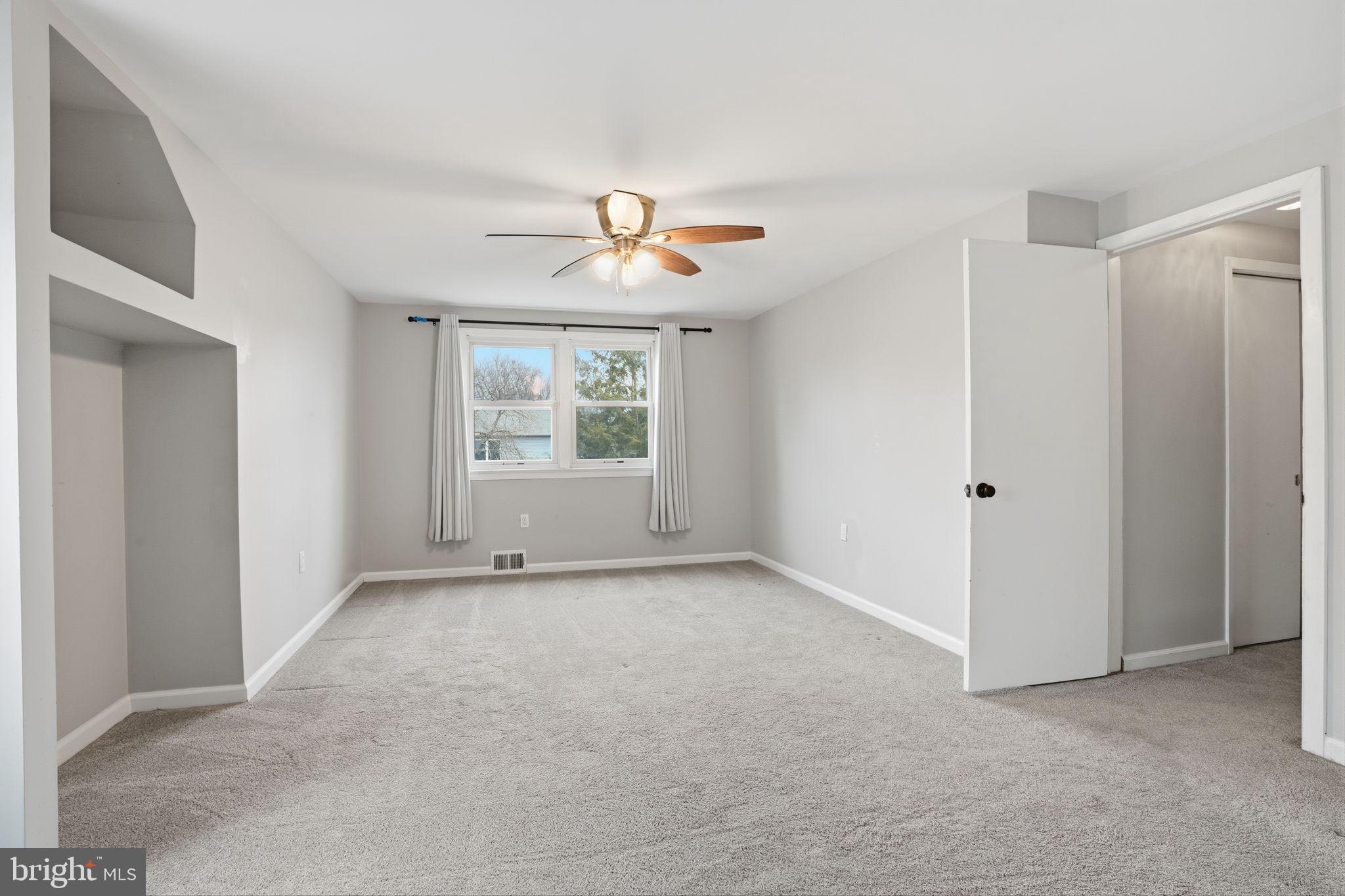 51 Unwin Drive Hamilton, NJ 08610 - Photo 24 of 32 a view of an empty room with a window