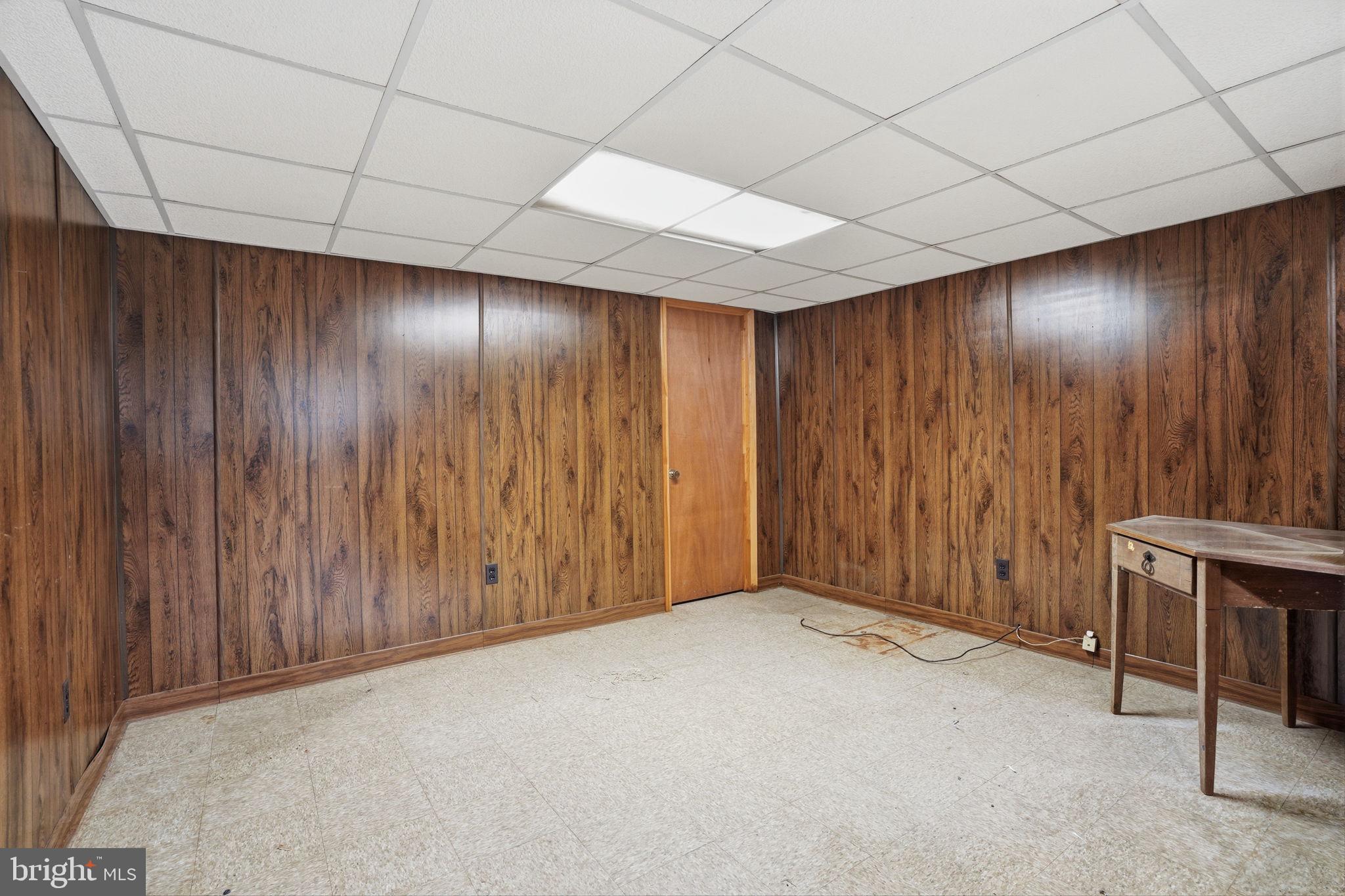 51 Unwin Drive Hamilton, NJ 08610 - Photo 30 of 32 an empty room with a wooden door